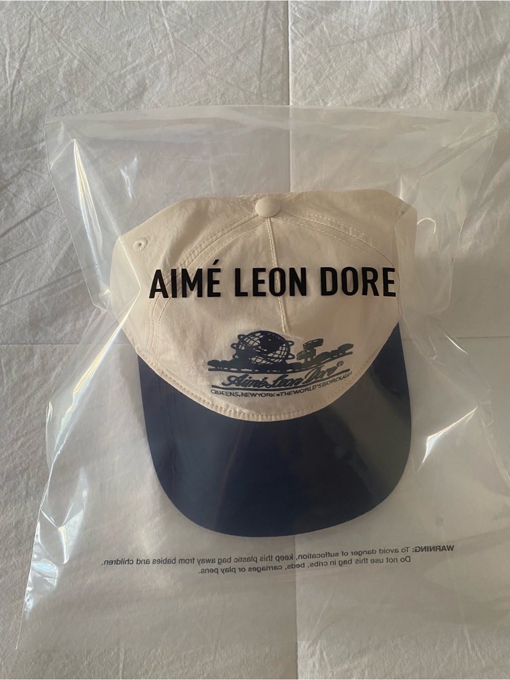 SS25 Aime Leon Dore Unisphere hat in Pristine White & Navy Blue - Picture 7 of 7